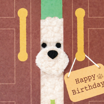 グリーティングカード 誕生日祝い　ふかふかドアからイヌ